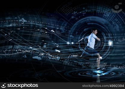 Running man. Young running man against digital media background