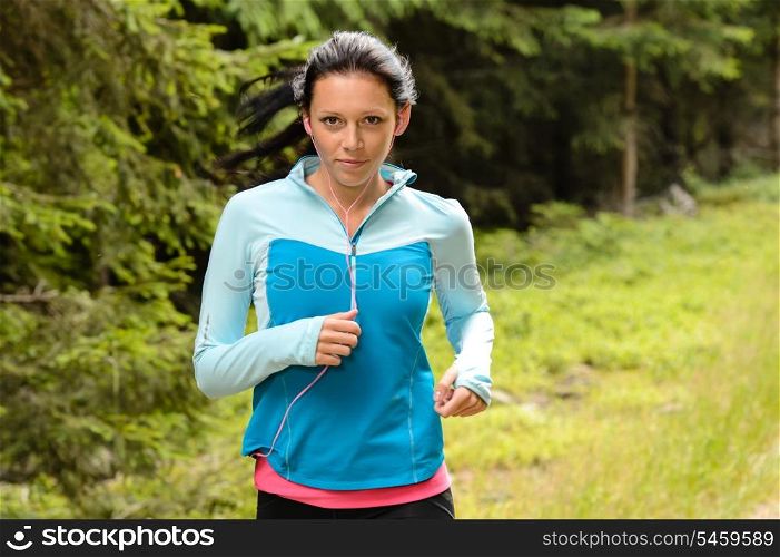 Running woman in forest fitness training outdoor