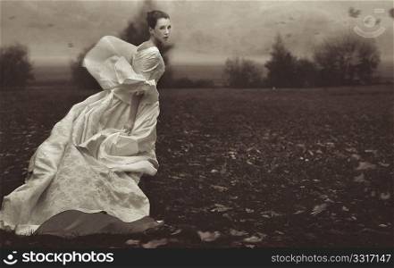 Running woman over nature background in black and white