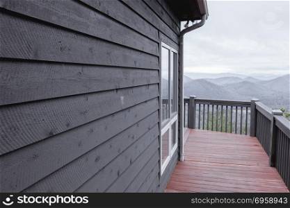 Rural cottage in the mountains. Rural wooden cottage cabin in the mountains