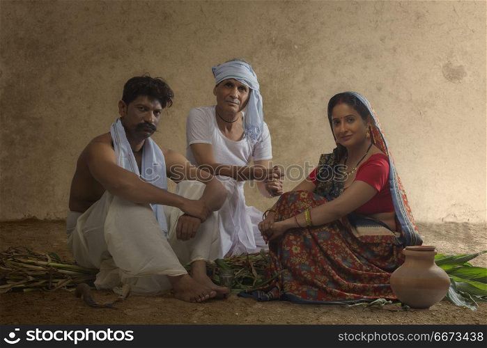 Rural Indian family sitting together