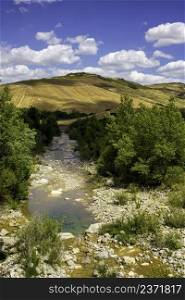 Rural landscape along the Cassia road near Radicofani, Siena province, Tuscany, Italy, at summer