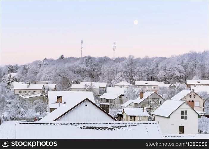 rural landscape in winter, houses and fields covered with snow. houses and fields covered with snow, rural landscape in winter