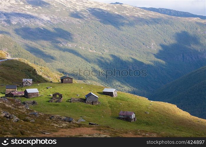 rural mountain cabin on a hill high at the mountains