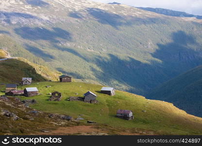 rural mountain cabin on a hill high at the mountains