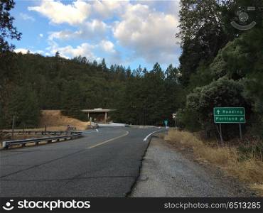 Rural onramp for Interstate 5 in California. Rural onramp for Interstate 5 in California with a sign pointing towards Redding and Portland