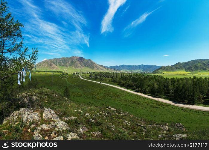 Rural road in mountains. Rural road in mountains in Karakol valley, Altay, Siberia, Russia