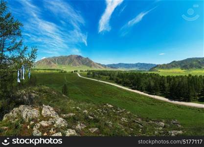 Rural road in mountains. Rural road in mountains in Karakol valley, Altay, Siberia, Russia