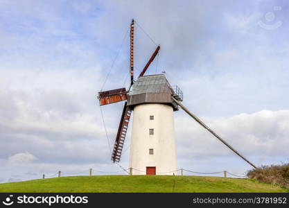 Rural Scene of Skerries Traditional Old Windmill. Stock