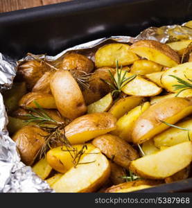 Rusic style potato with rosemary baked in foil