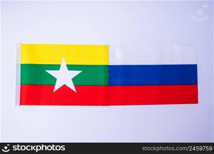 Russia against Myanmar flags. freindship, war, conflict, Politics and relationship concept