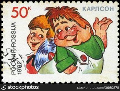 RUSSIA - CIRCA 1992: A stamp printed in Russia shows Kid and Carlson, series Characters from Children&acute;s Books, circa 1992