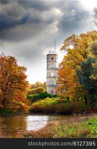 Russia,Gatchina, bright autumn tree in park near a palace