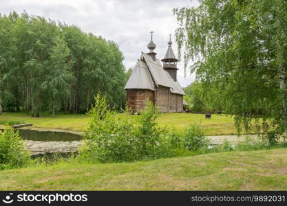 Russia June 29, 2020 Kostroma, view of the old wooden houses in the park of Russian art in Kostroma, photo was taken on a cloudy summer day. view of the old wooden houses in the park of Russian art in Kostroma, photo was taken on a cloudy summer day