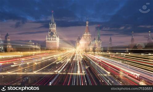 Russia, Moscow. view on Moscow Kremlin at night. Abstract scene with tracks of street lights.