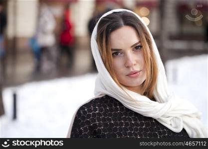 Russian beauty woman in the national patterned shawl