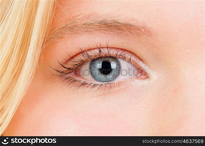 Russian-born woman with blue eyes and blond hair closely