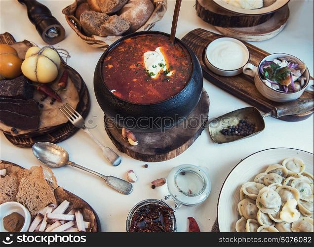 Russian borsch at pot. Russian borsch at pot on the table