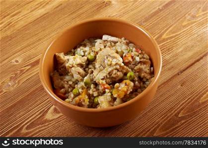 Russian Buckwheat porridge vegetables und with chicken closeup
