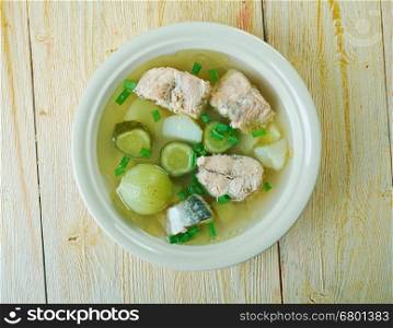 Russian fish solyanka soup with salmon
