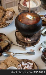 Russian food table. Russian food: borsch pickles cheese meat dumplings and fat