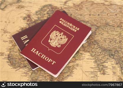 Russian International passports on map close up