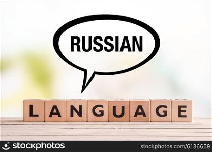 Russian language lesson sign made of cubes on a table