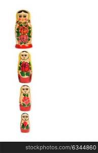 Russian matryoshka dolls in a row isolated on white