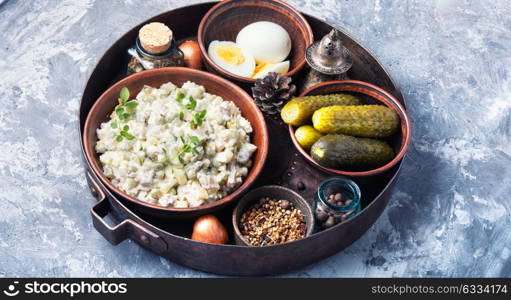 Russian meat salad Olivier. traditional Russian salad Olivier, with meat and vegetables.
