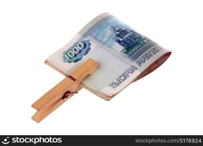 Russian money and clothespins isolated on white background