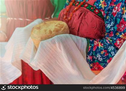 Russian old-fashioned wedding. Hands with bread, meeting with guests