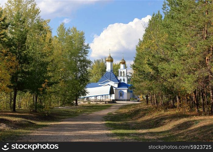 Russian Orthodox chapel in the autumn forest