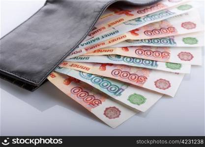 Russian rouble banknotes in black leather wallet