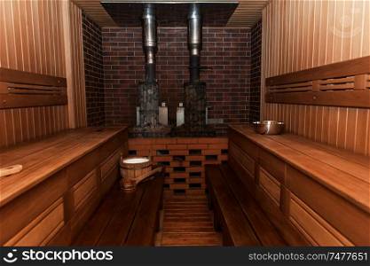 Russian sauna interier with accessories: wooden basins, scoops. Russian sauna interier