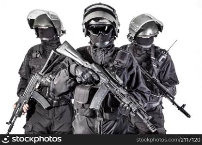 Russian special forces operators in black uniform and bulletproof helmets. Russian special forces