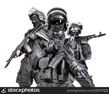 Russian special forces operators in black uniform and bulletproof helmets. Russian special forces