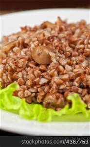 Russian traditional buckwheat with mushrooms and onion