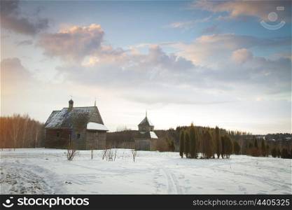 Russian village in the winter in the snow.