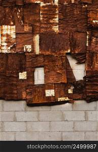 Rust background with several pieces of tin