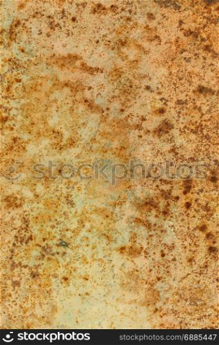 Rusted painted metal wall. Rusty metal background with streaks of rust. The metal surface rusted spots. Rusted painted metal wall. Rusty metal background with streaks of rust. Rust stains. The metal surface rusted spots