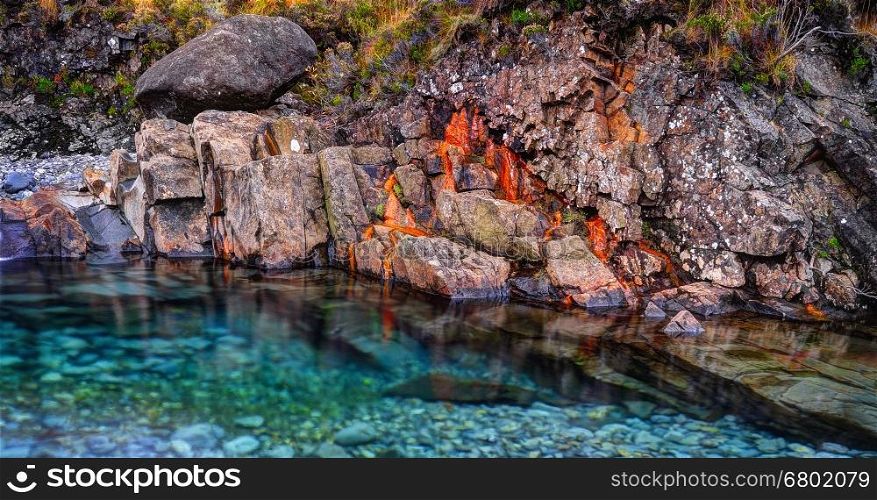 Rusted rocks in Fairy Pools, Glen Brittle, Isle of Skye, Inner Hebrides, Highlands, Scotland