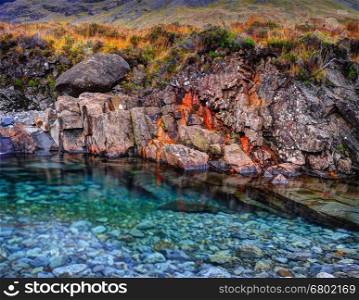 Rusted rocks in Fairy Pools, Glen Brittle, Isle of Skye, Inner Hebrides, Highlands, Scotland