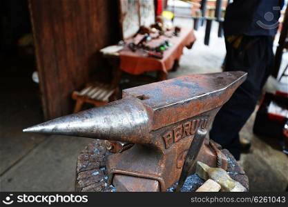 Rustic anvil in blacksmith&rsquo;s workshop