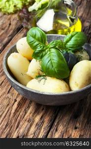 rustic boiled potatoes. rustic potatoes boiled with a bunch of fresh basil.Russian food