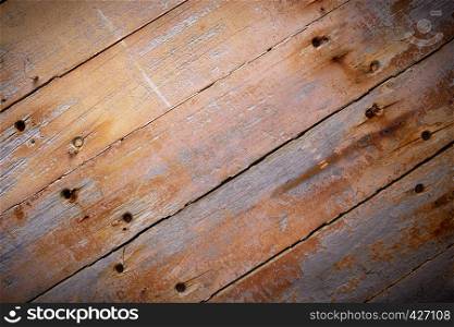 Rustic brown wood planks background with vignetting effect