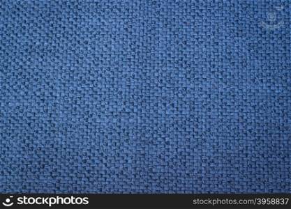 Rustic canvas fabric texture in blue color.
