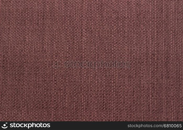 Rustic canvas fabric texture in brown color.