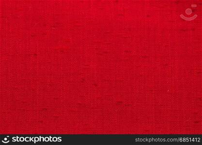 Rustic canvas fabric texture in red color.