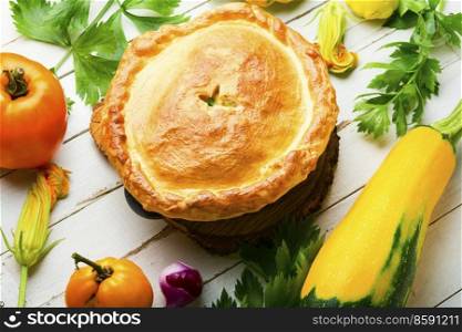 Rustic closed vegetable pie. Pie with zucchini and squash.. Homemade pie with zucchini and mushroom