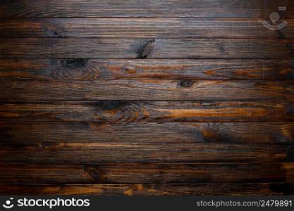 Rustic dark wooden table background top view